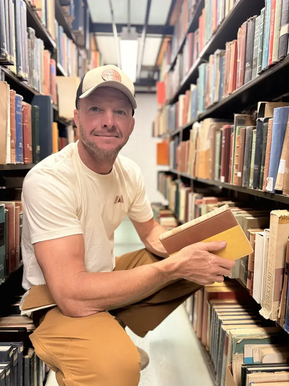 Derik Keith researching historical sources in an Oklahoma archive
