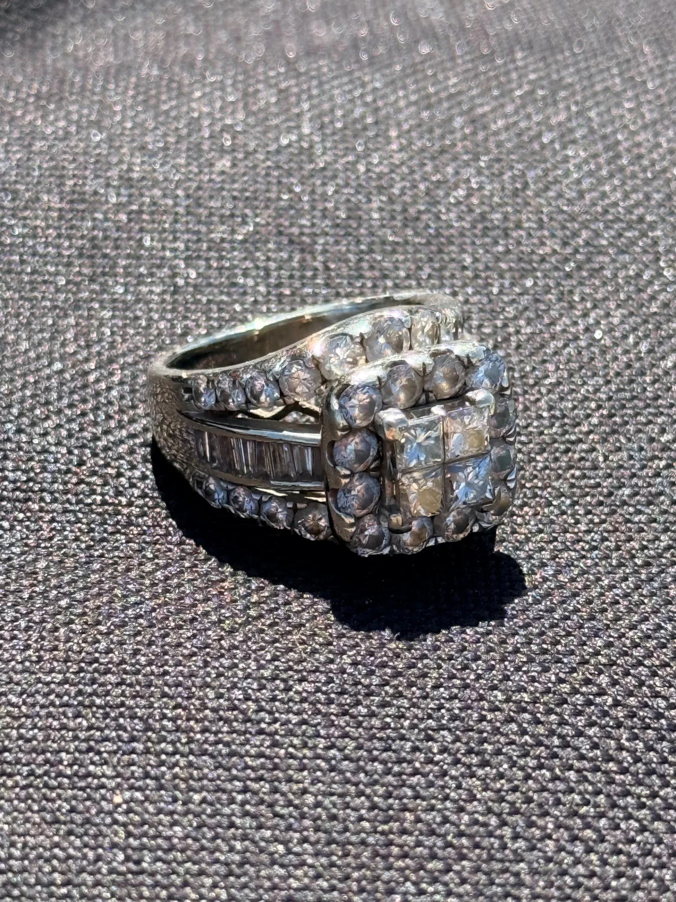 Recovered 14k white gold wedding ring with a square diamond cluster and diamond-set band