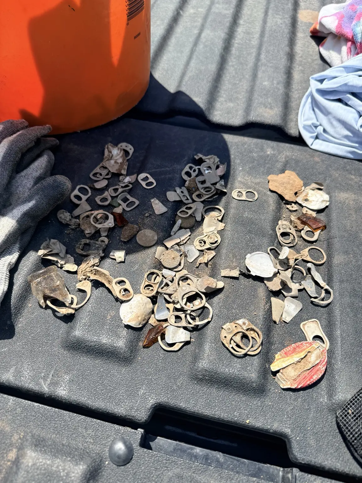 A portion of the metal trash, lead sinkers and fishing debris removed during an Oklahoma river recovery search