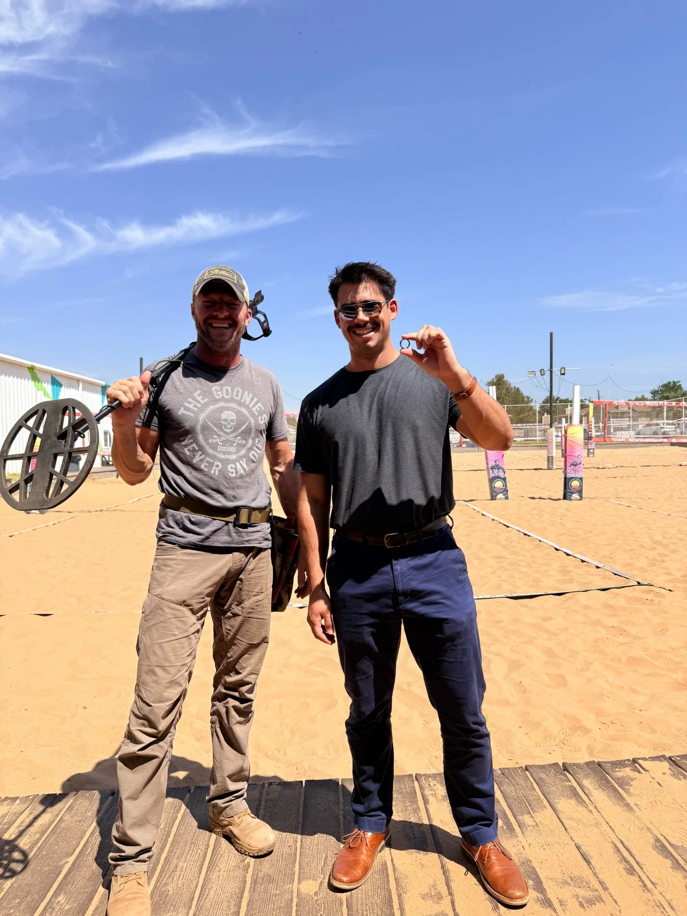 Recovered tungsten wedding ring returned after a sand volleyball court search