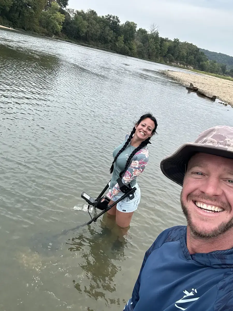 Derik and Crystal conducting a shallow-water recovery search
